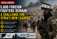 Armed foreign fighters standing in war-damaged Syrian city after Assad government collapse